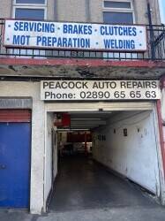 Busy car mechanic garage in east Belfast main street Photo 1