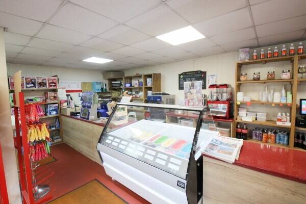 Coastal Village Ice Cream Business & Stunning House Photo 5