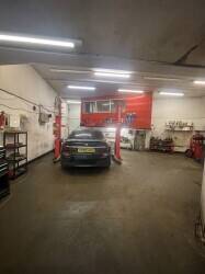Busy car mechanic garage in east Belfast main street Photo 5