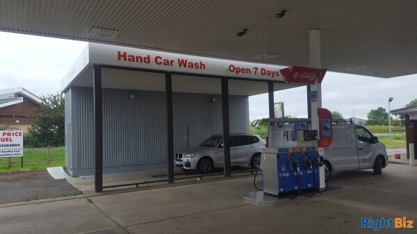 Hand car wash for rent in a large ESSO filling station next to a busy road & a large Pound stretcher Photo 6