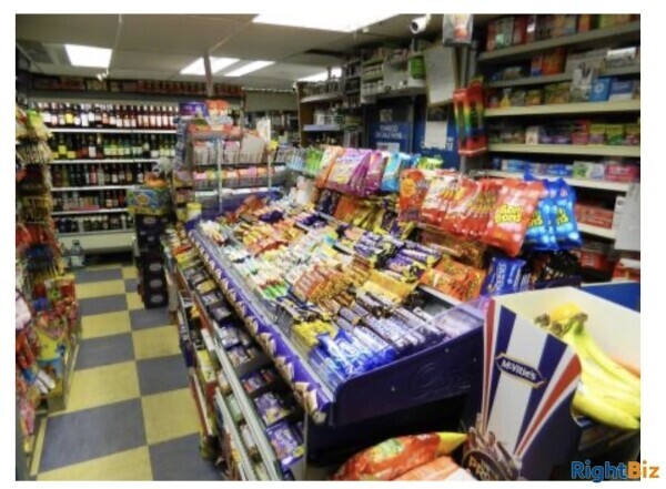 SUPERB CONVENIENCE STORE / OFF LICENCE / NEWSAGENTS WITH LARGE THREE BEDROOM FLAT NO COMPETITION Photo 1