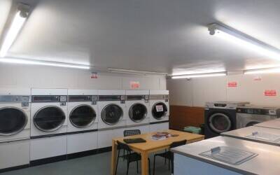 Excellent Freehold Property, currently trading as a laundrette business Photo 6