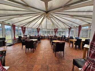 lifestyle business. Licensed bar, cafe, restaurant, B&B &pound;10,000 in-going premium, rent &pound;16,000 per a Photo 1