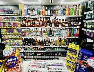 Symbol Fascia Convenience Store Opposite Busy Football Stadium Photo 7