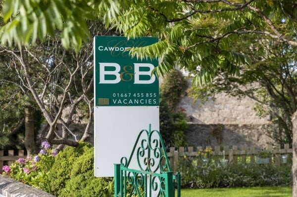 Boutique 9-Bedroom Coastal Hospitality Business with Café & Owners’ Accommodation