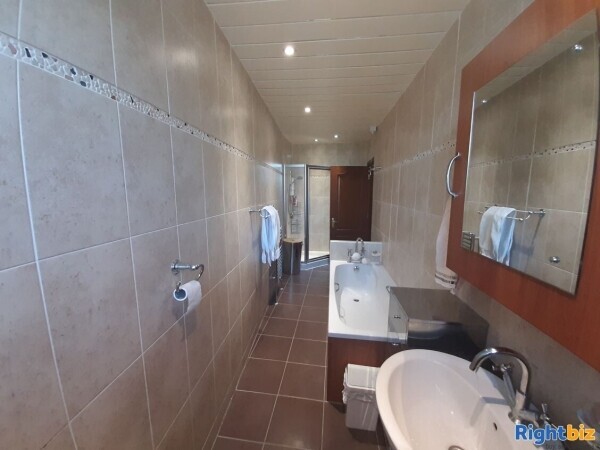 Busy convenience store, Post Office and spacious flat for sale in central Scotland Photo 8
