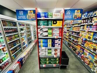 Symbol Fascia Convenience Store Opposite Busy Football Stadium Photo 1