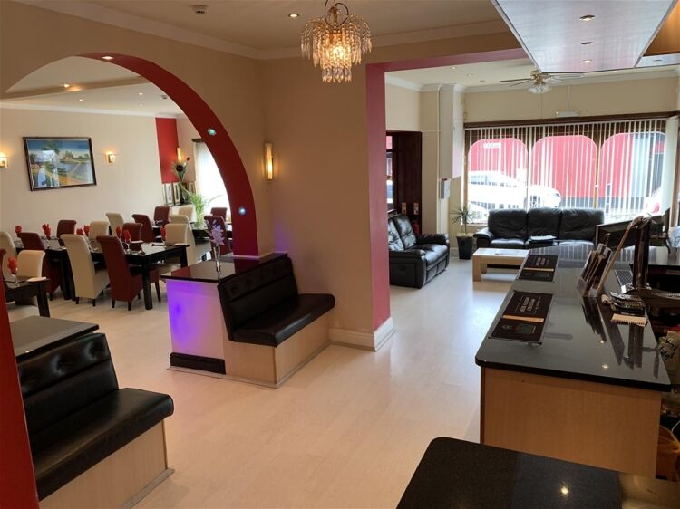 IMPRESSIVE FREEHOLD LICENSED INDIAN RESTAURANT IN MILFORD HAVEN TOWN CENTRE