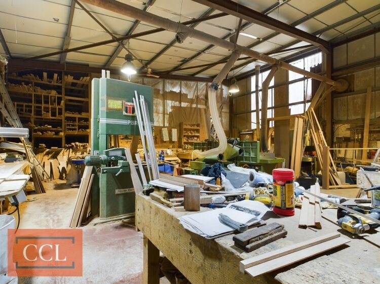 Significant commercial property with a secure yard Photo 5