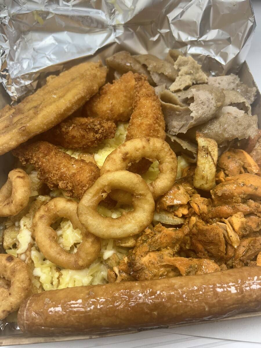 Fish and chips with kebab and pizza