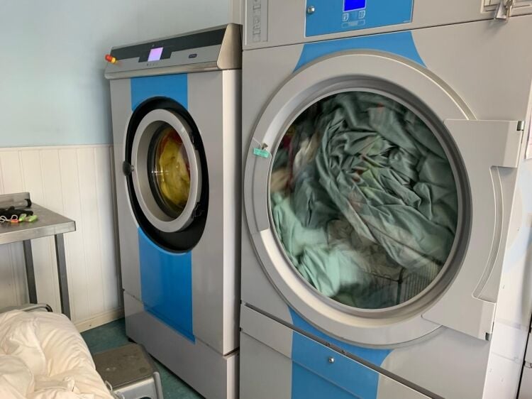 Trusted Village Dry Cleaning Business with Loyal Client Base and No Local Competition Photo 5