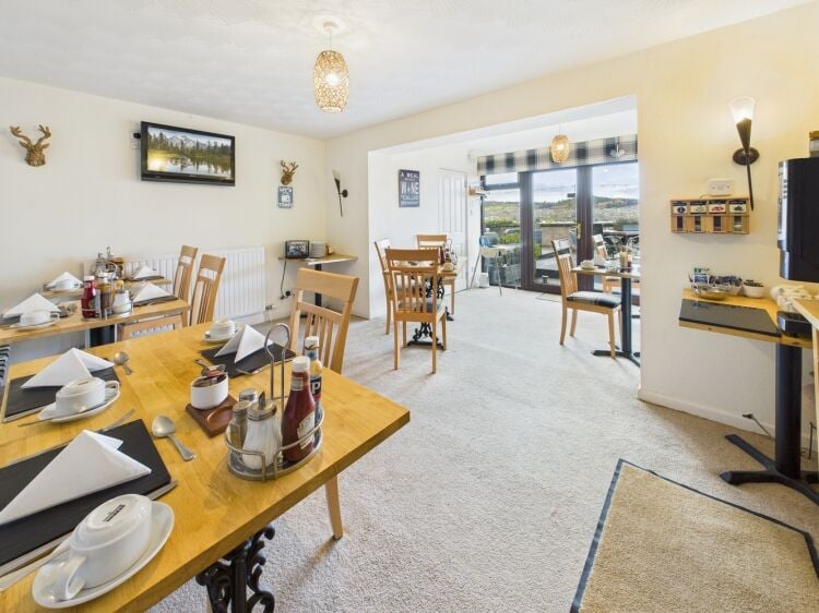 Castle views, city centre convenience, modern Highland hospitality awaits.