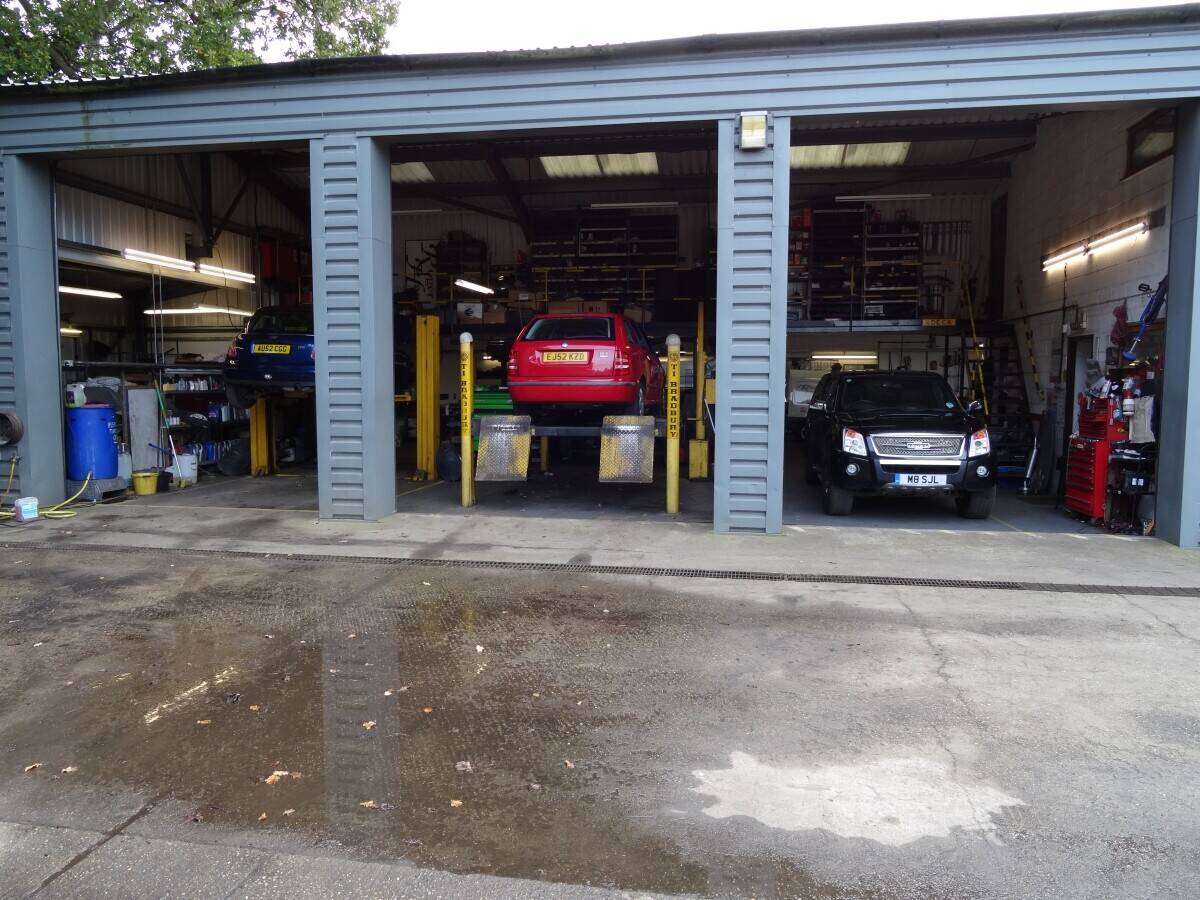 Garage Services MOT Station and Car sales in prominent main road location to large market town.Devel Photo 6