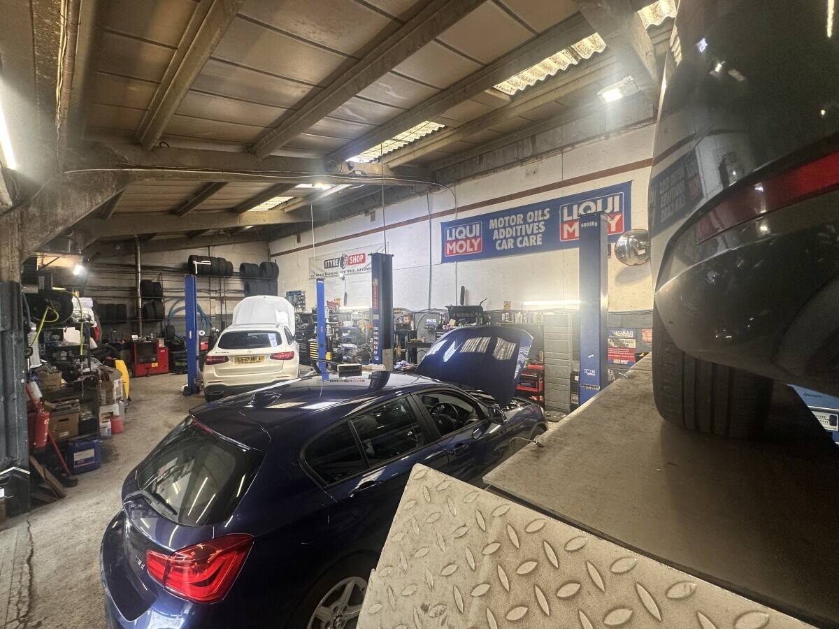 Fully equipped car repair garage with tyre fitting and motorcycle mot bay Photo 6