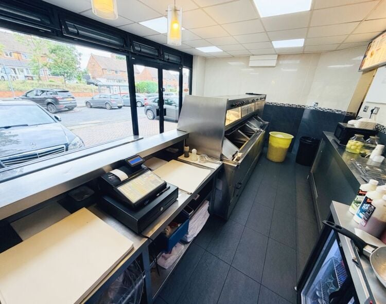 Well presented fish & chip takeaway, offered freehold or new lease,same ownership 22 years. Photo 5