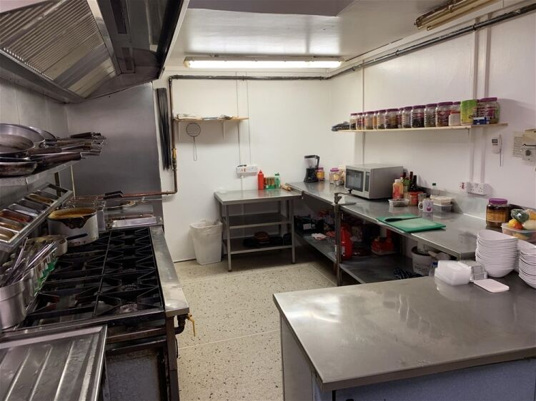 IMPRESSIVE FREEHOLD LICENSED INDIAN RESTAURANT IN MILFORD HAVEN TOWN CENTRE