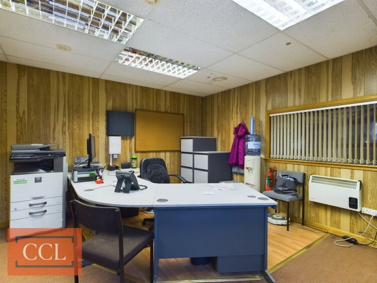 Significant commercial property with a secure yard Photo 6