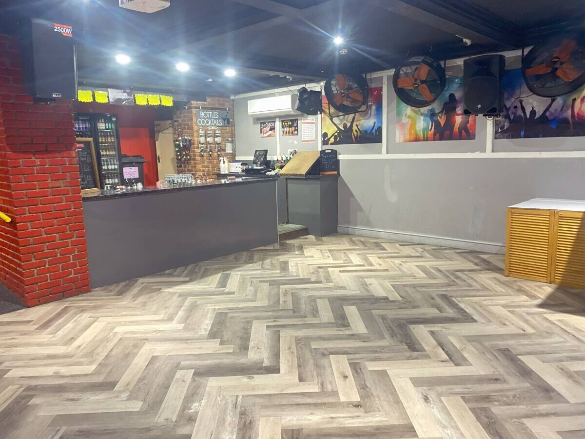 CUMBRIA - TOWN CENTRE BAR WITH THREE SELF-CONTAINED FLATS