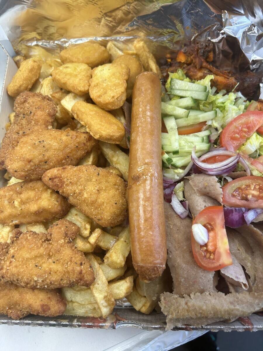 Fish and chips with kebab and pizza