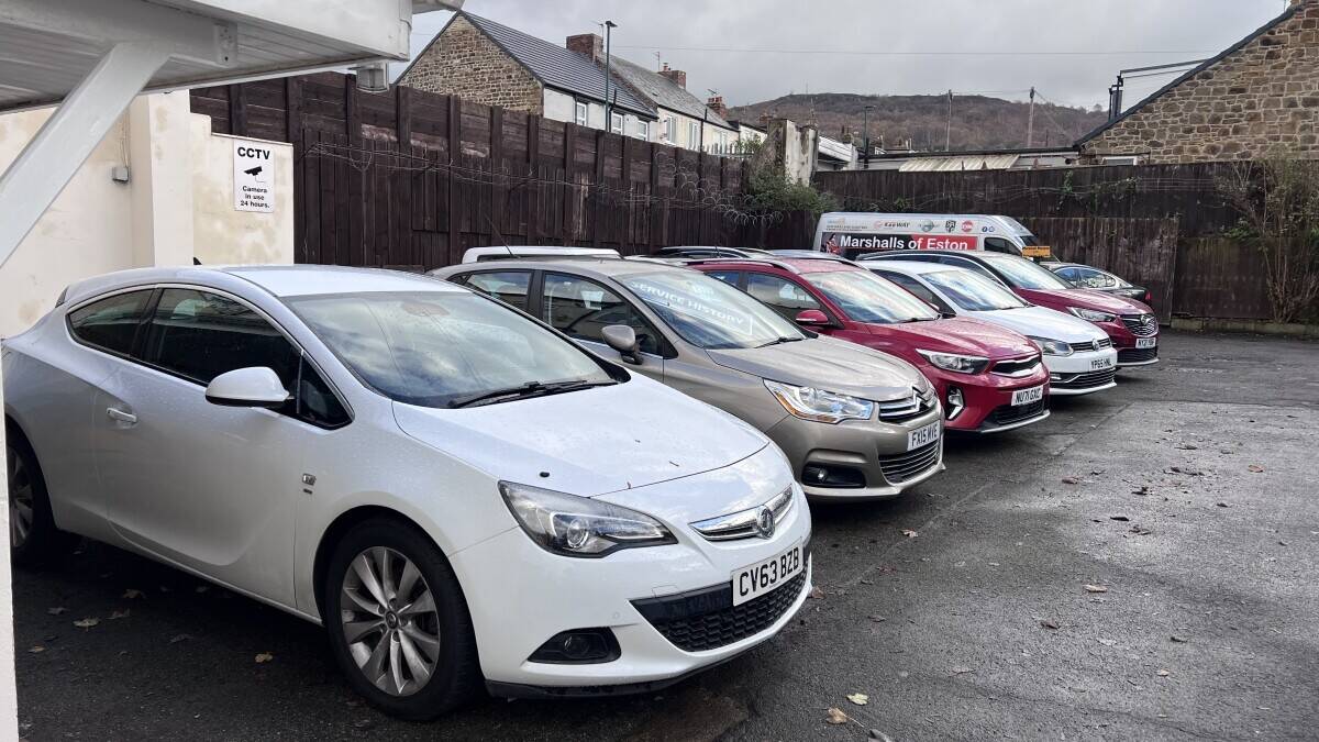 Established Car sales and repair dealership with flats.With planning permission to build on Photo 6