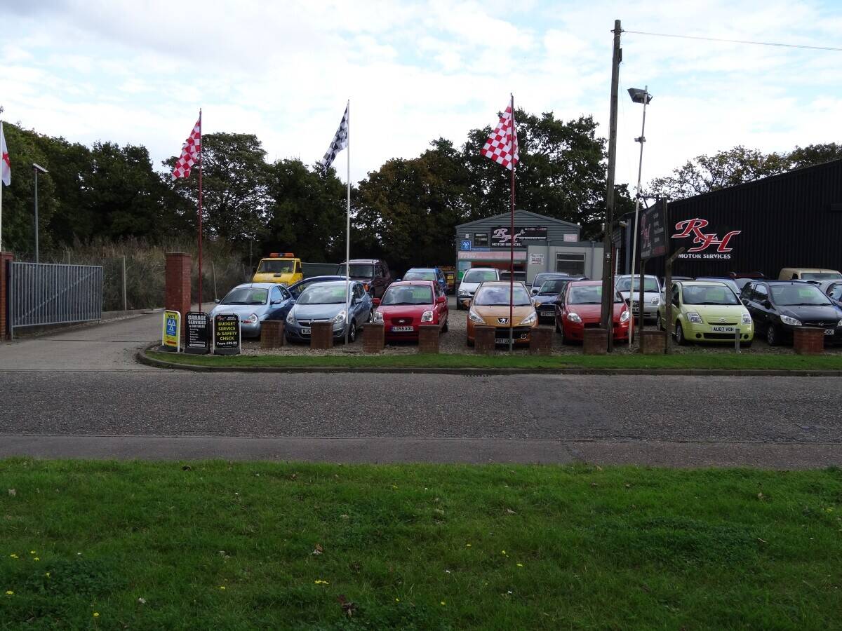 Garage Services MOT Station and Car sales in prominent main road location to large market town.Devel