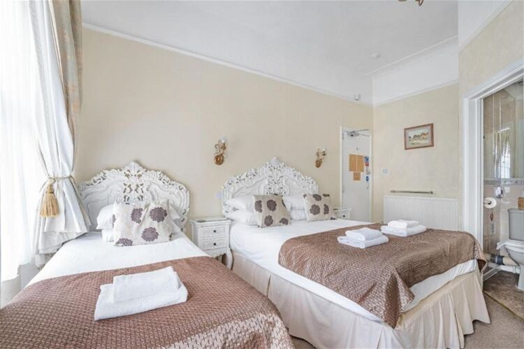 Established Seven-Bedroom Guest House in the Heart of Torquay For Sale in Torquay