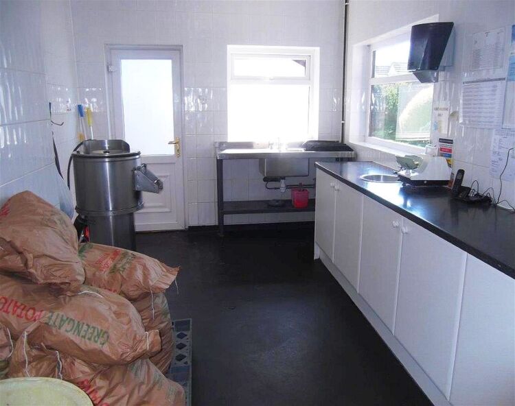 Modern fish & chip lock-up, Fleetwood residential pitch