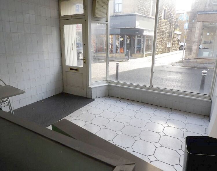 Closed fish and chip shop with three-bedroom accommodation