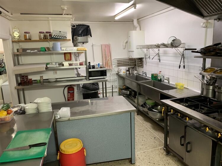 IMPRESSIVE FREEHOLD LICENSED INDIAN RESTAURANT IN MILFORD HAVEN TOWN CENTRE