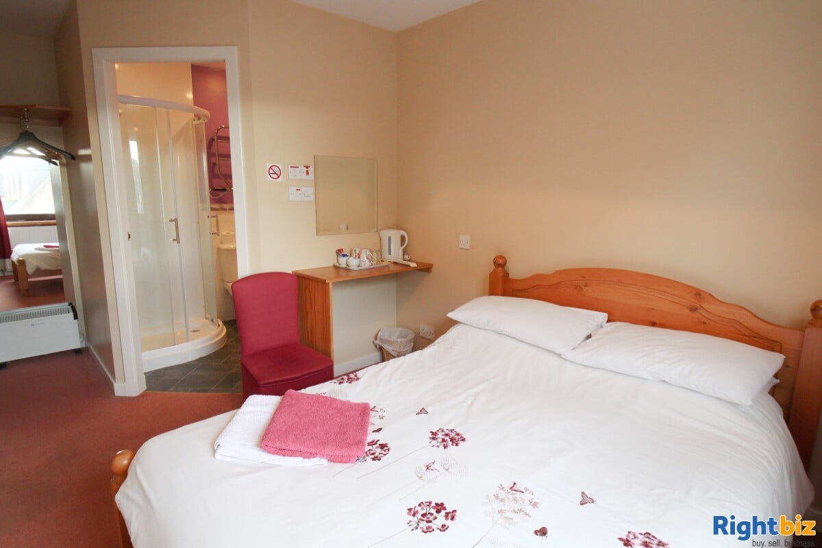 Traditional Sports Bar with Lettings Rooms and Owner's Accommodation Photo 6