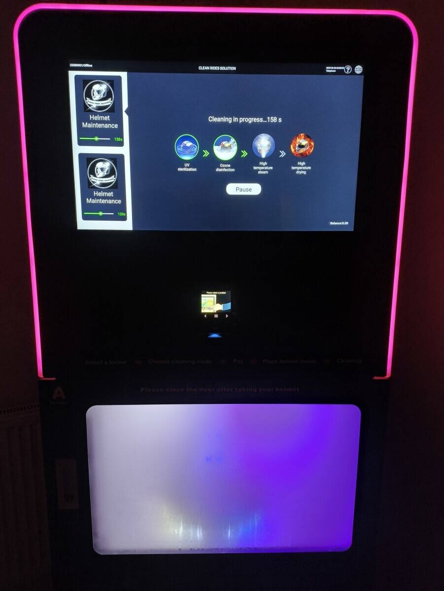 Helmet sanitizer vending machine