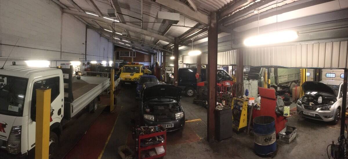 Garage Services MOT Station and Car sales in prominent main road location to large market town.Devel