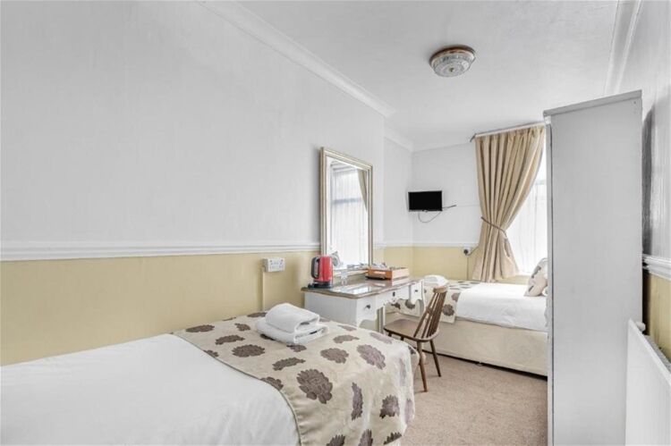 Established Seven-Bedroom Guest House in the Heart of Torquay For Sale in Torquay