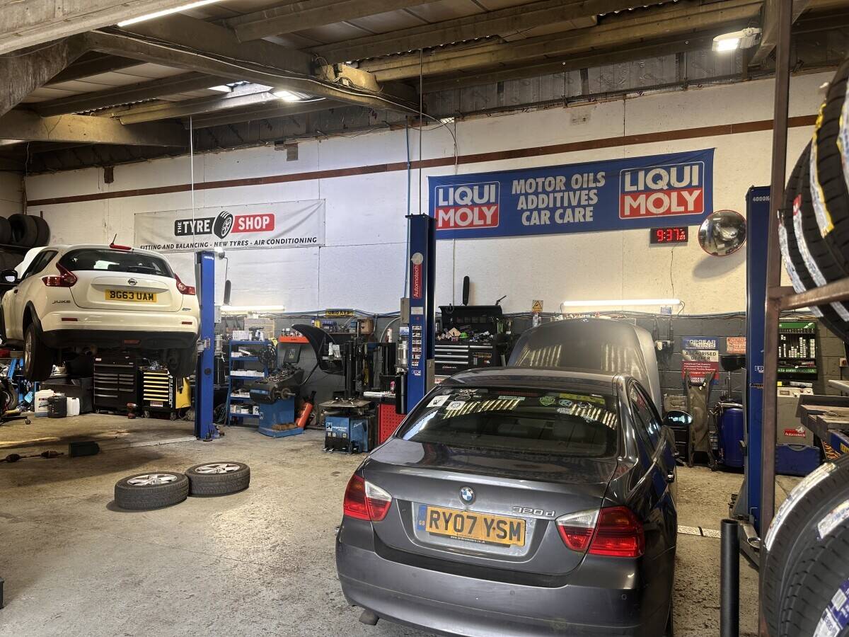 Fully equipped car repair garage with tyre fitting and motorcycle mot bay
