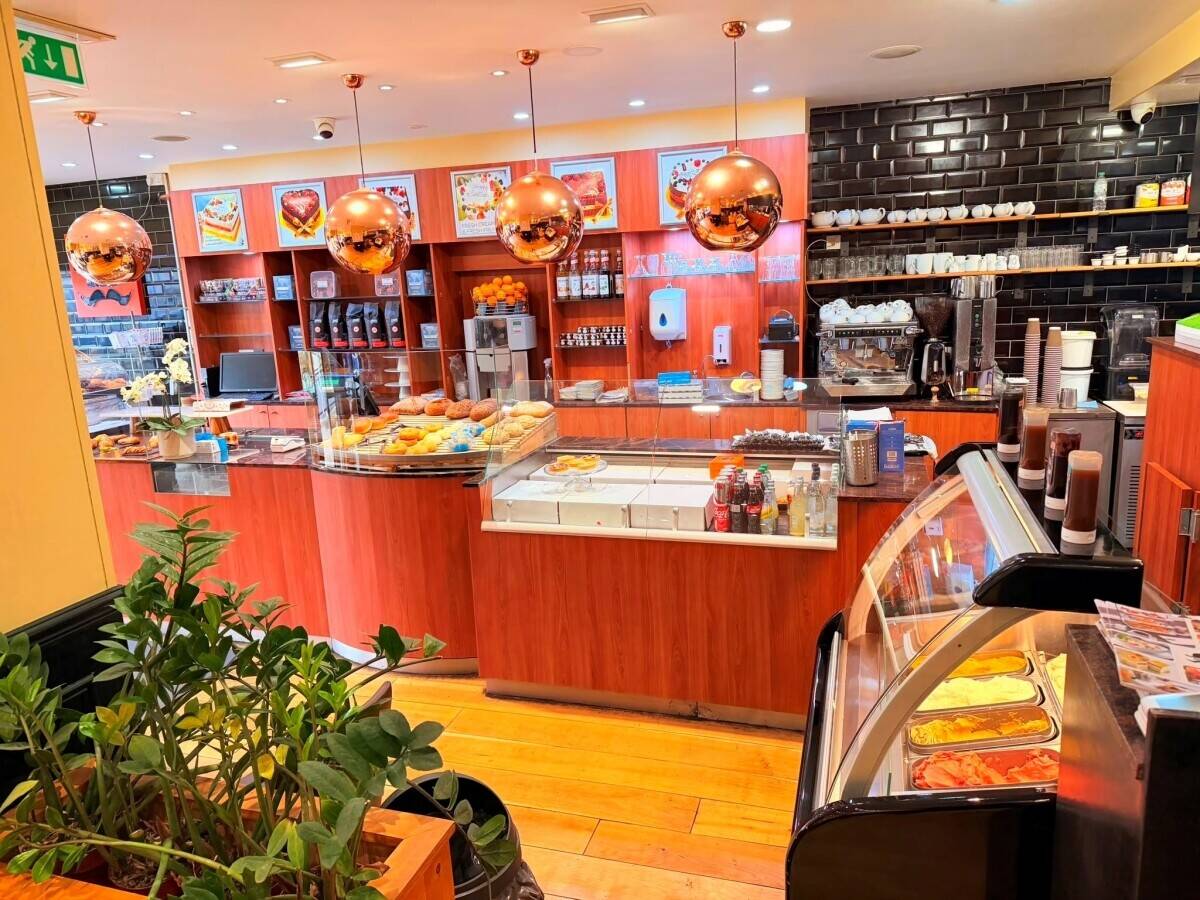 Premium café on Epping High Street that comes with 2 three bedroom flats with  'sitting tenants'