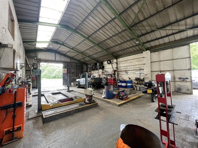 Under Offer: Roadside Commercial Site with Forecourt & Large Workshops For Sale in Winkleigh