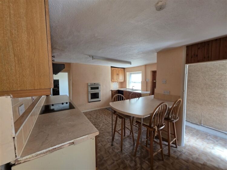 Auction Lot: Spacious Detached 3-Bedroom House with adjoining Workshop & Ample Parking For Sale in Newton Abbot