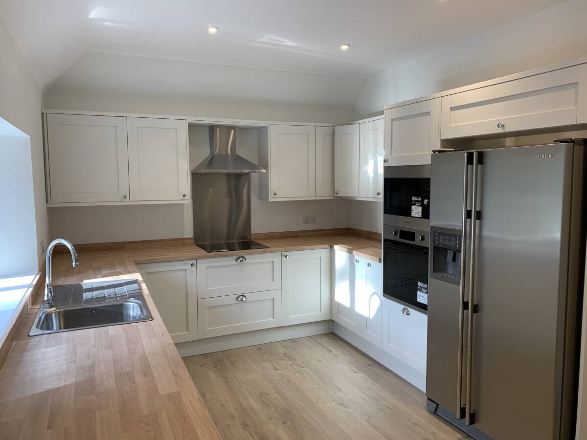 Refurbished 4 Bedroom Family Home with 4 Self- Contained Lodge Business Opportunity Available Photo 8