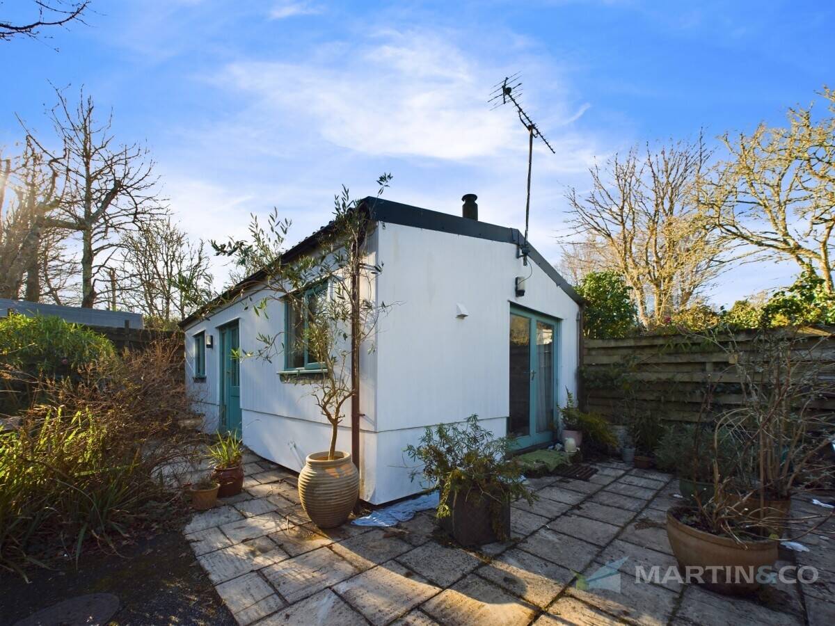 RETIREMENT SALE. Charming Village Shop with five bedroom accommodation and separate one bedroom holiday let. Photo 9