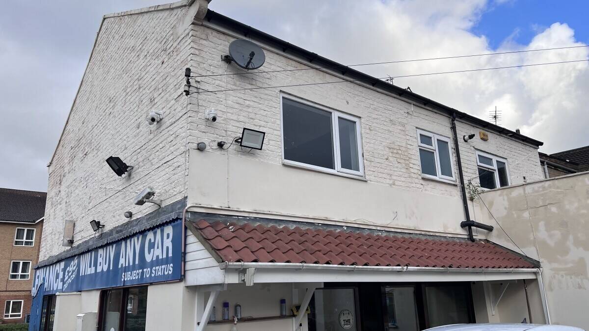 Established Car sales and repair dealership with flats.With planning permission to build on Photo 8
