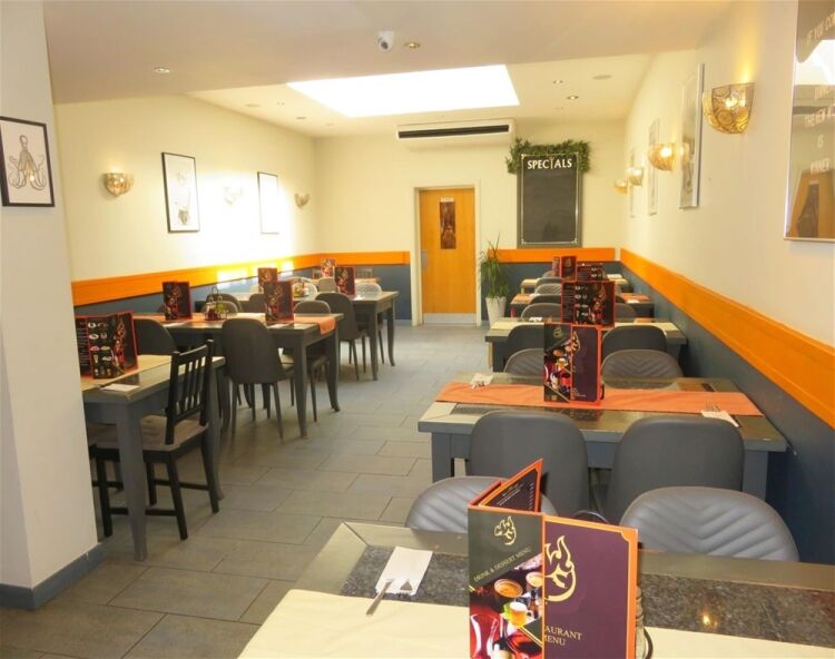 Well established Fish & chip shop with let rooms above producing £42,000 annual rent income in East Photo 8