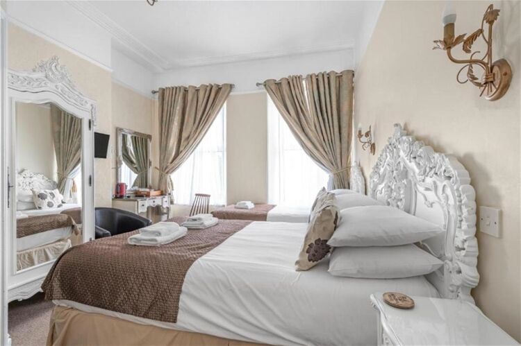 Established Seven-Bedroom Guest House in the Heart of Torquay For Sale in Torquay