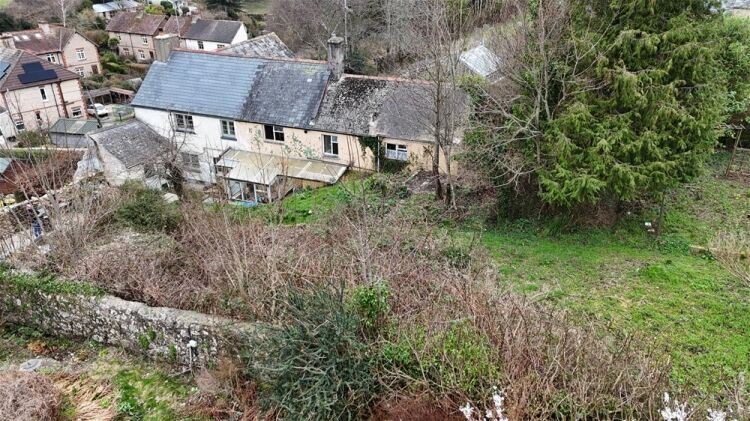 Auction Lot: Renovation-Ready 3-Bedroom Cottage plus Development Land For Sale in Newton Abbot