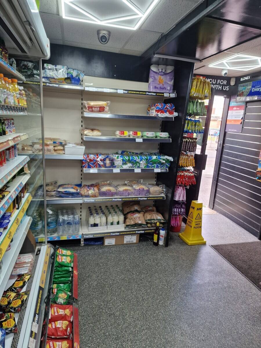 Convenience store operates 24 hours a day Photo 8
