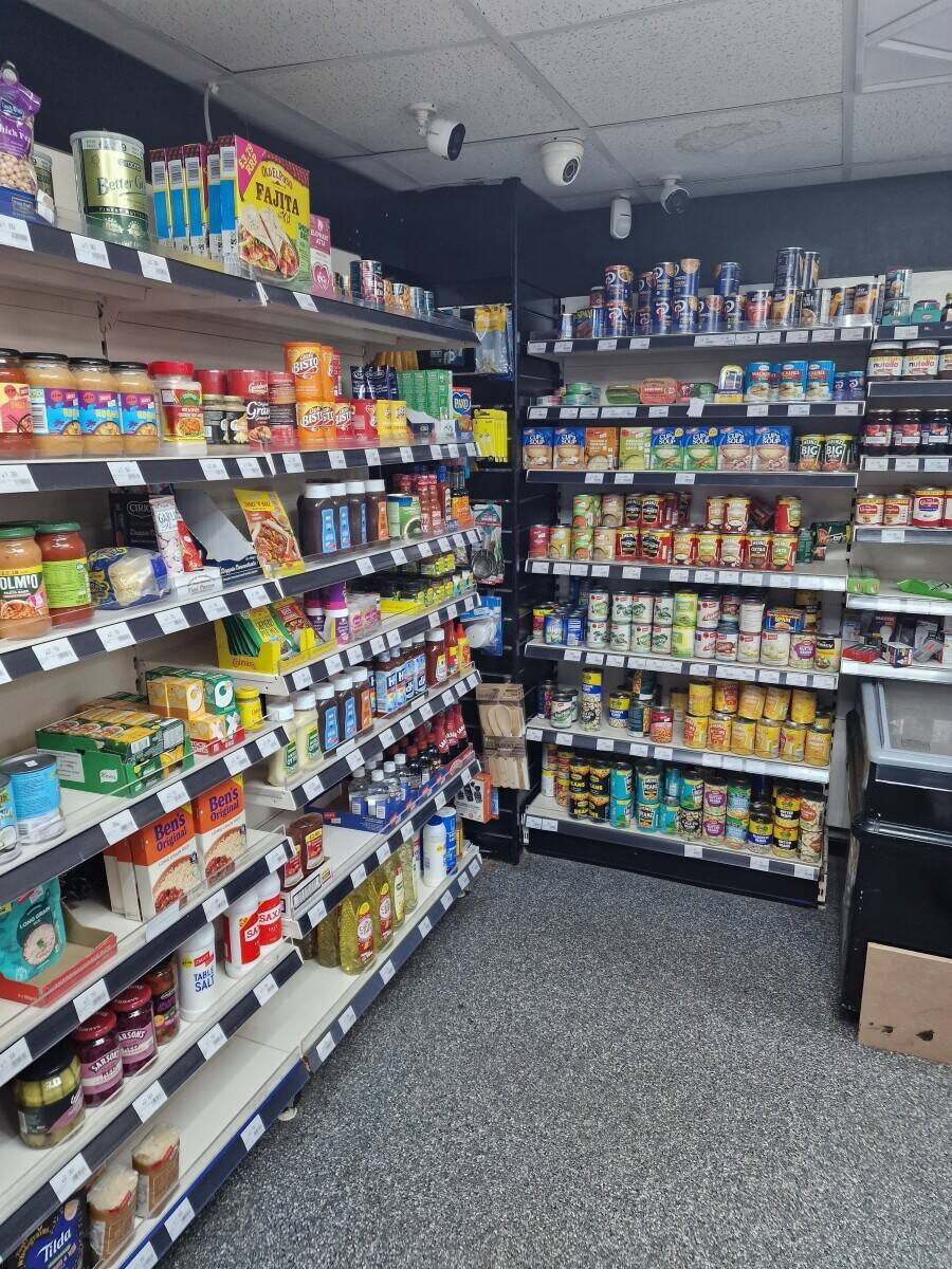 Convenience store operates 24 hours a day Photo 9