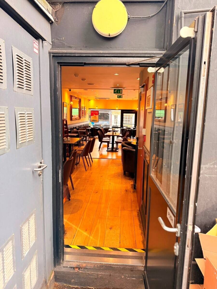 Premium café on Epping High Street that comes with 2 three bedroom flats with  'sitting tenants' Photo 9